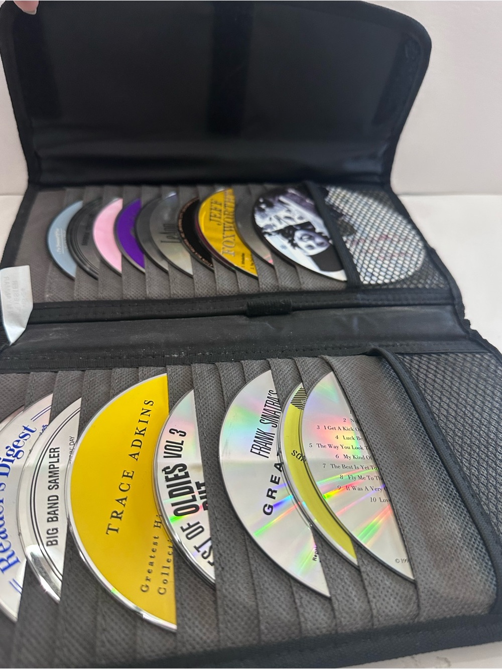 Black Multi-Slot CD Wallet Organizer - Portable Media Storage with CDs